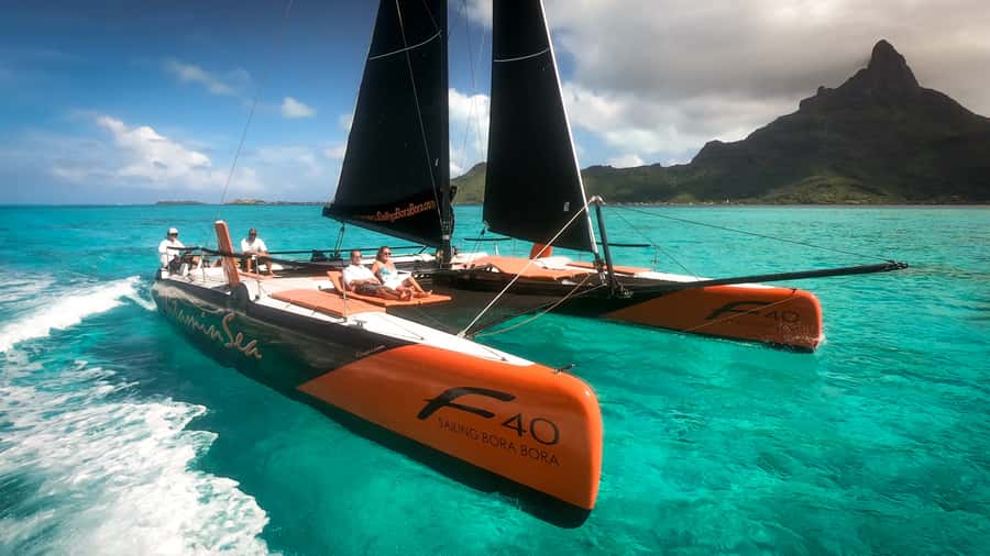Bora Bora: Half Day Catamaran Sailing & Snorkelling - Setting out from the hotel dock by speedboat