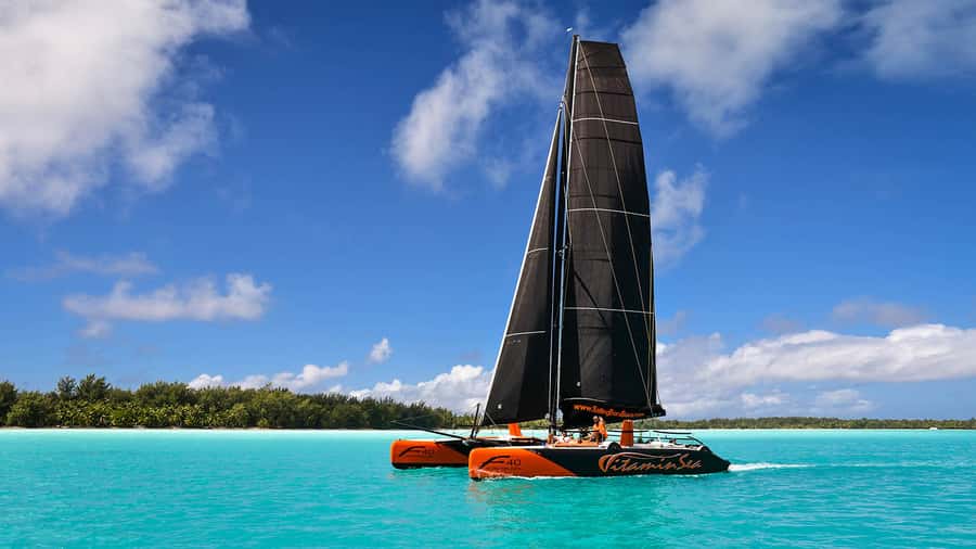 Bora Bora: Sunset Catamaran Cruise with Snacks and Drinks - A two-hour sail built around the changing sky