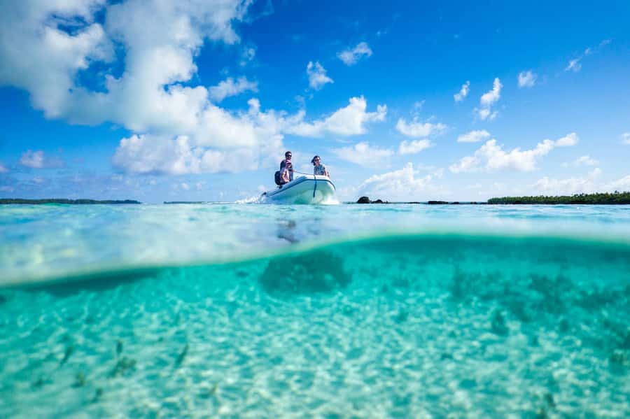 From Tahiti: Tetiaroa Island Tour by Sailing Catamaran - Arriving by dinghy and walking toward Bird’s Island
