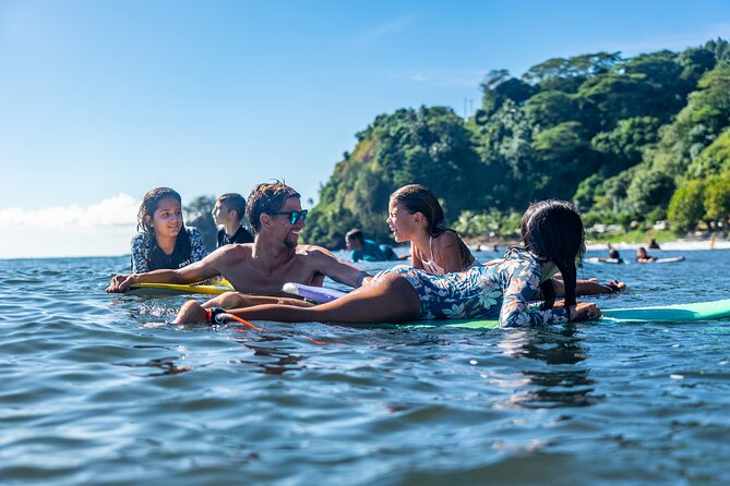 Group Guided Surfing Lesson in Tahiti - Learning the stand-up technique