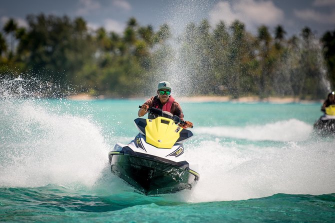 Island jet tour - The motu stop: swimming, fruit, and coconut