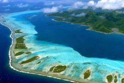 Private flight, in a light plane over the Polynesian motus from Raiatea