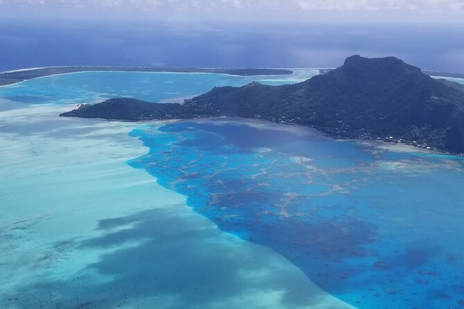 Private flight, in a light plane over the Polynesian motus from Raiatea - The longer flight and the Bora Bora payoff