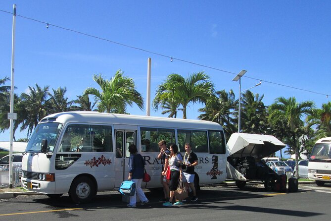 Rarotonga International Arrivals Seat in Coach Transfer - Shared transport, with a small-group feel