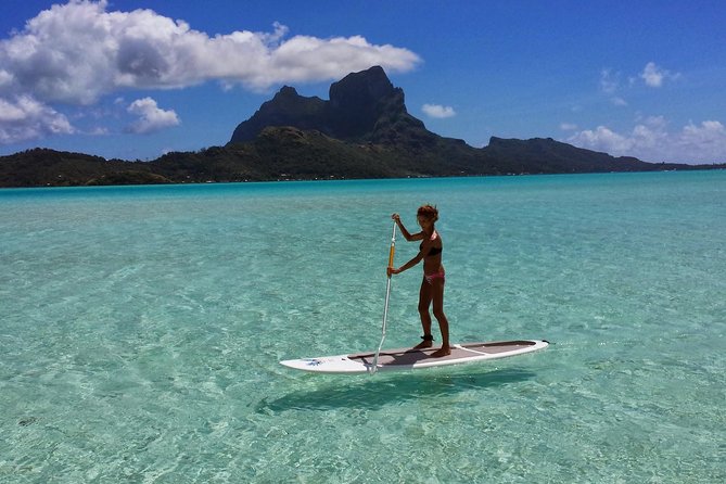 Stroll out of time on the lagoon of Bora Bora - From the hotel pier to the calm water