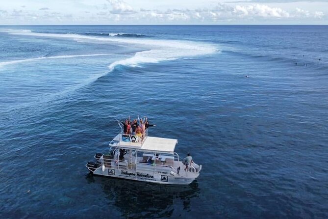 Taxi Boat to Watch the Teahupoo International Surfing Competition - Rooftop views, covered seating, and photography