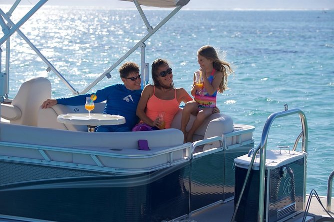 Toa Boat Bora Bora Private Lagoon tour On Majestic Pontoon Boat - Snorkeling with fish, rays, sharks, and coral gardens