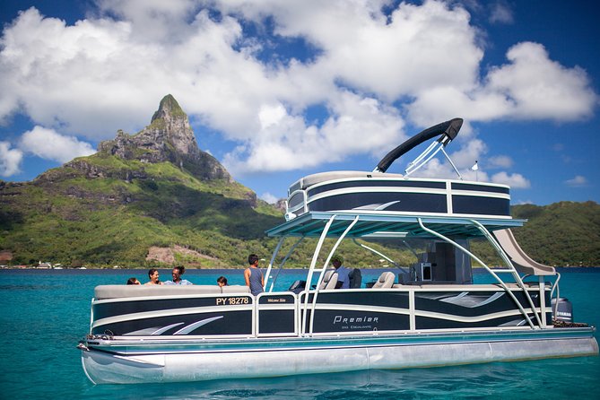 Toa Boat Bora Bora Private Lagoon tour with Lunch on Ambassador Boat - The boat’s slide changes the mood