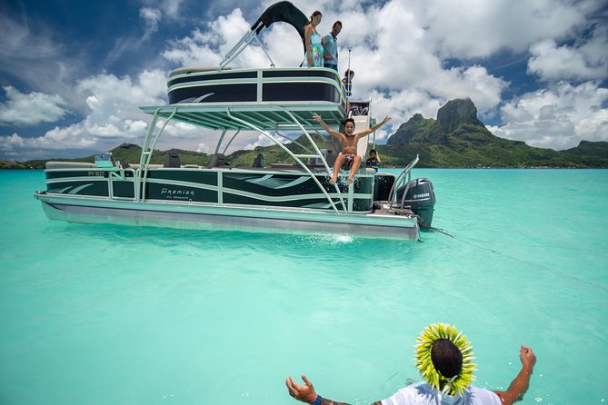 Toa Boat Bora Bora Private Lagoon tour with Lunch on Ambassador Boat - Reading Bora Bora’s turquoise lagoon from the water